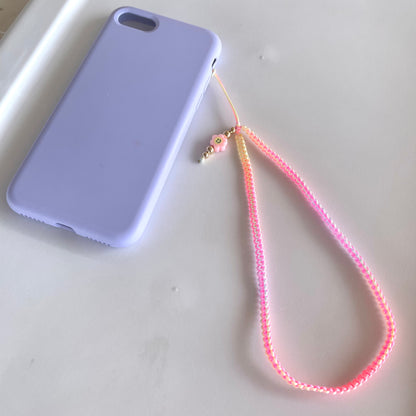 Phone strap tejido con charm de fimo