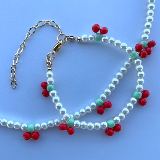 Set de collar y pulsera de perla sintética con cerezas